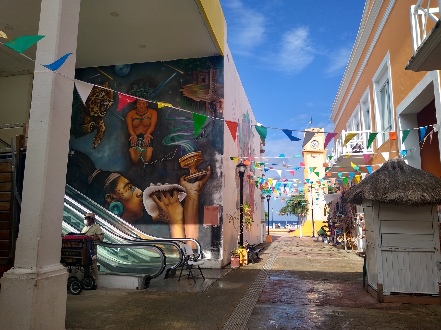 A colorful street and mural area while walking around Cozumel.