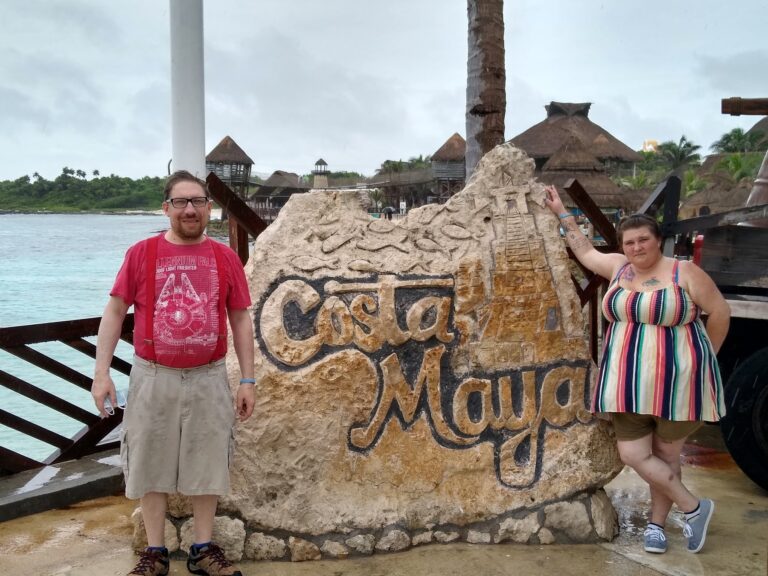 Joe and Christy beside the Costa Maya sign during their November 2021 port day.